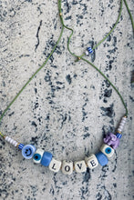 Afbeelding in Gallery-weergave laden, Jewels By SJ €59.95 Ketting Lila LOVE Smiley - Olifant
